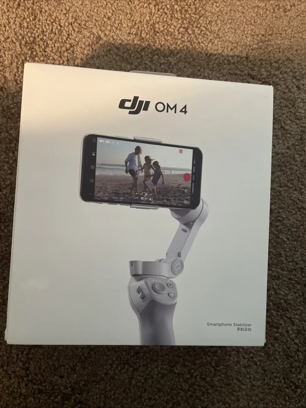 DJI OM4 3-Axis Gimbal Stabilizer / Tripod for Smartphones New